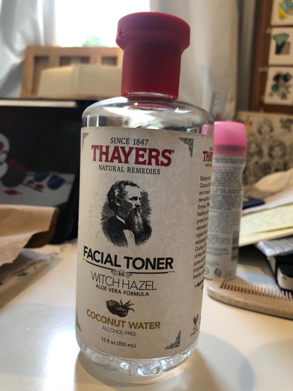 a reviewer&#x27;s bottle of coconut water witch hazel