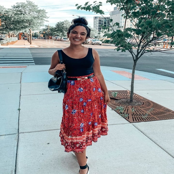 a different reviewer wearing the dress in red