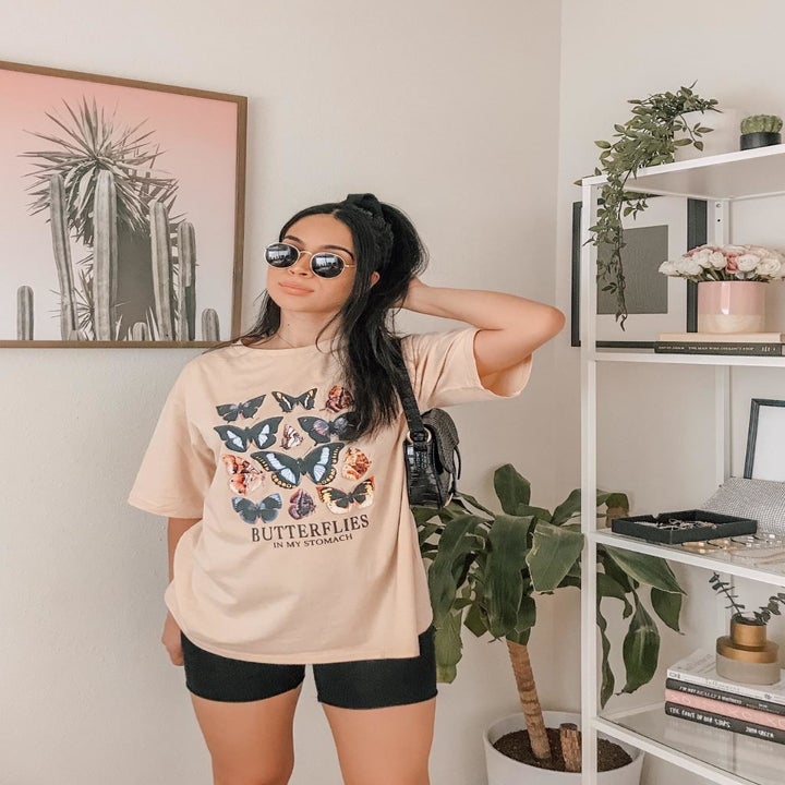 a different reviewer wearing the top in beige