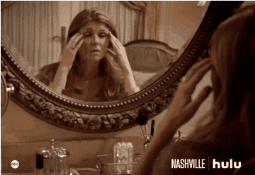 Gif of character looking in mirror from television show &quot;Nashville&quot;