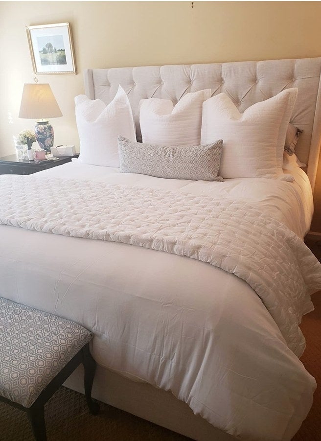 A white duvet cover in a reviewer&#x27;s home