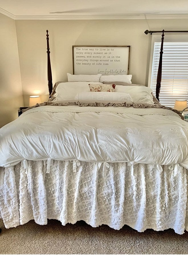 A boho-style white duvet cover in a reviewer&#x27;s home