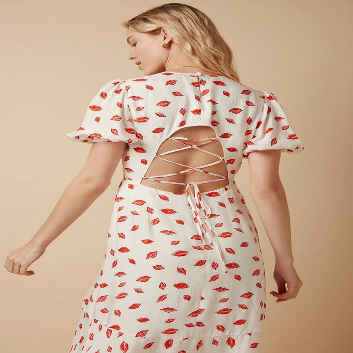 model wearing the criss cross back dress