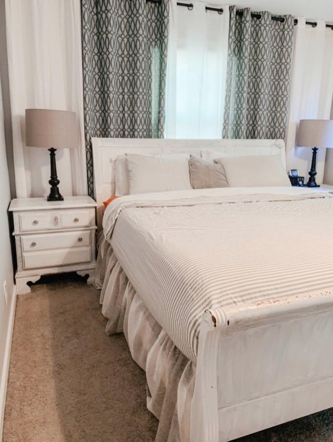 A tan striped duvet cover in a reviewer&#x27;s home