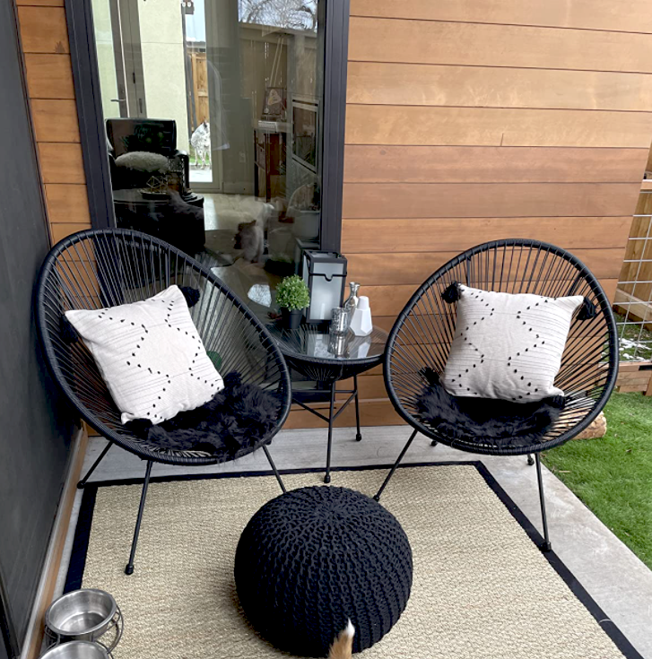 reviewer image of the black set styled on a small patio 