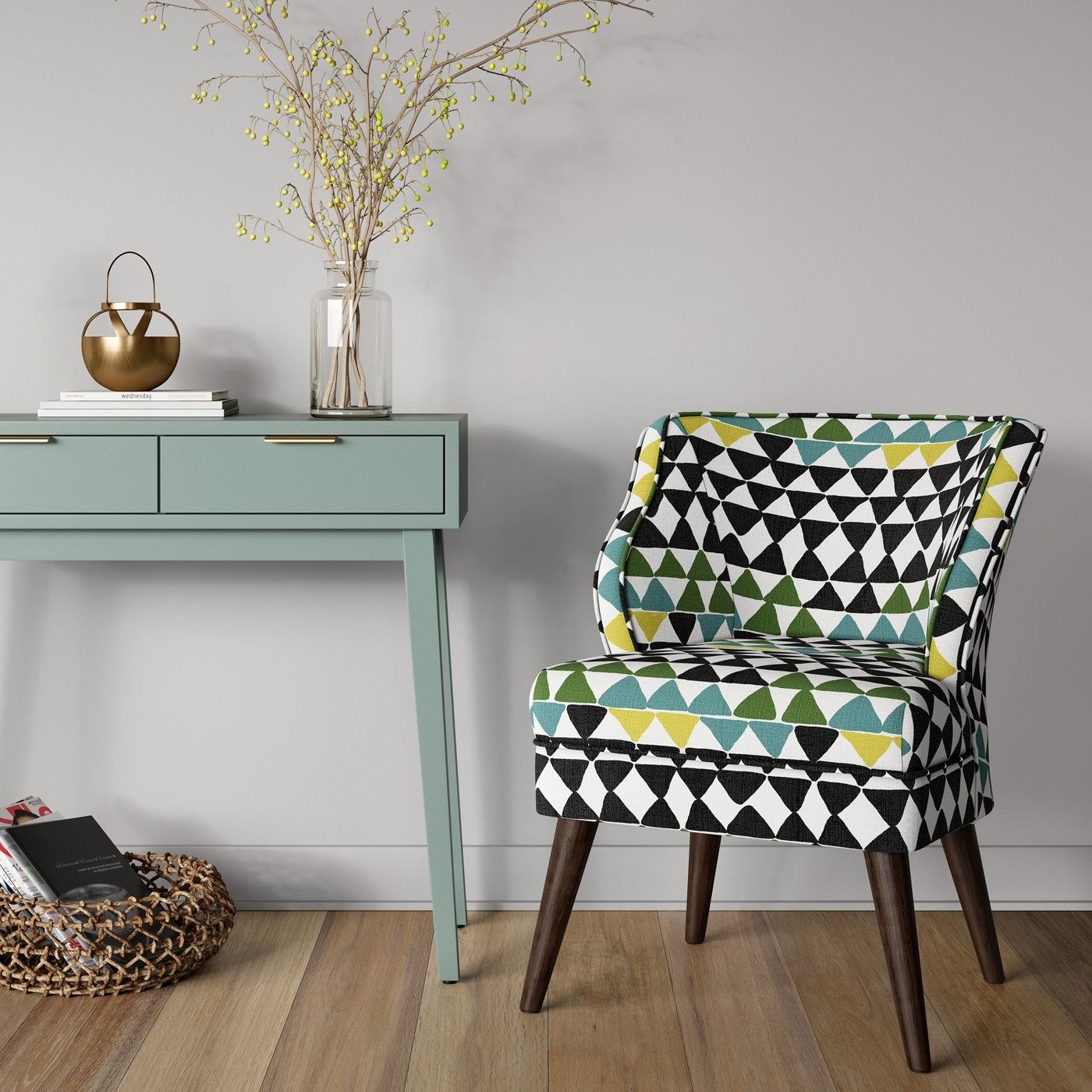 The midcentury armchair in green and blue diamond pattern with brown wood legs