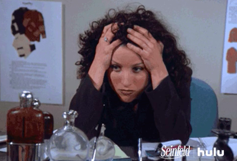 Elaine from &quot;Seinfeld&quot; holding her head in her hands