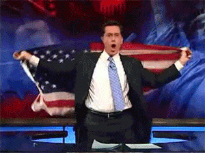 Stephen Colbert dancing with an American flag