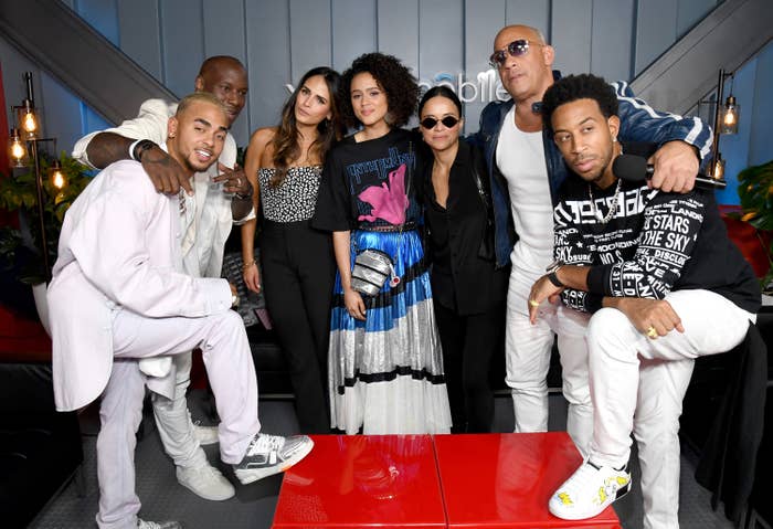 The cast of F9 pose together at an event