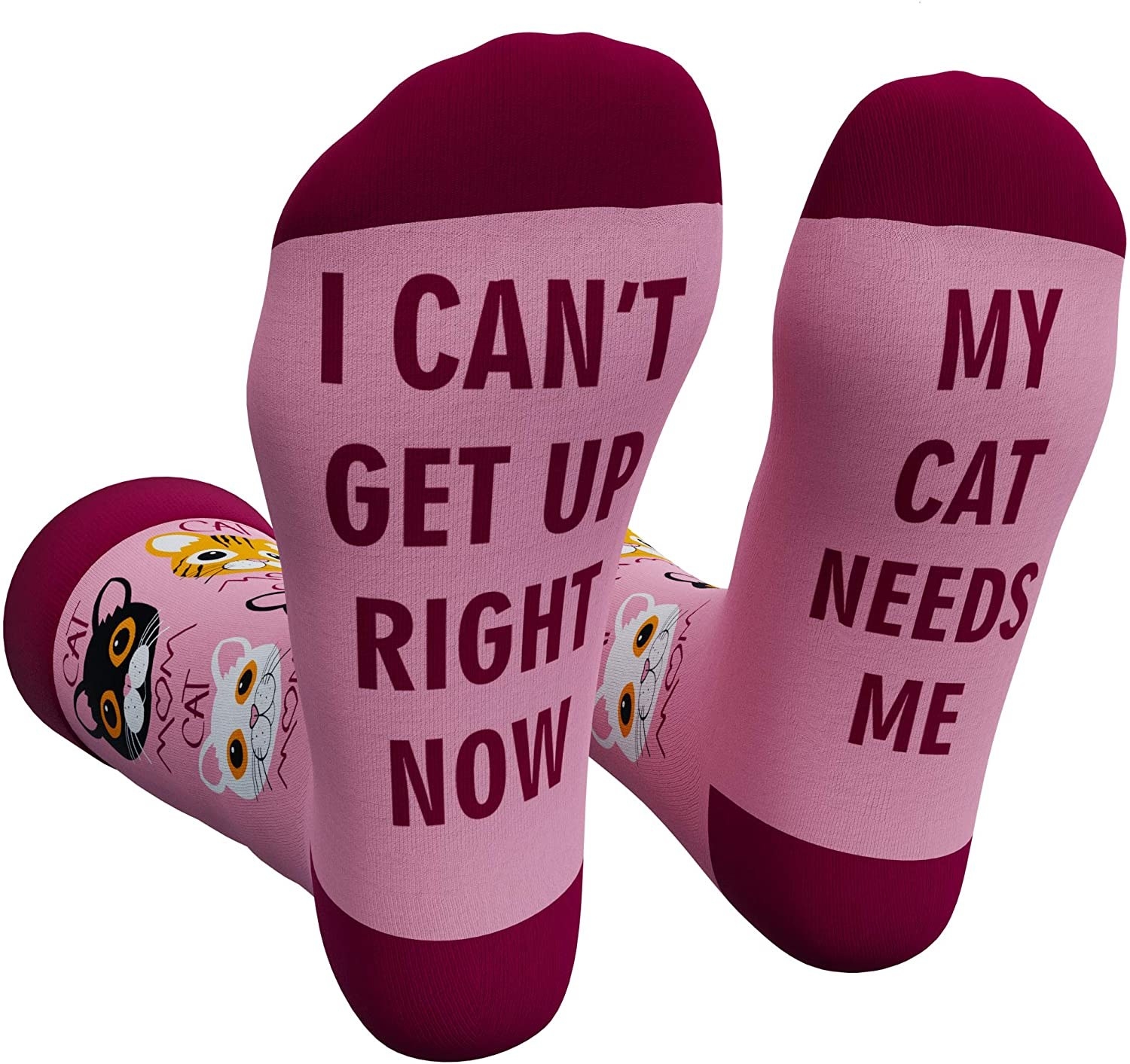 Pink and red socks with pictures of cats and the words &quot;Cat Mom&quot; on the legs, and &quot;I Can&#x27;t Get Up Right Now&quot; on the bottom of right foot, and &quot;My Cat Needs Me&quot; on the bottom of left foot