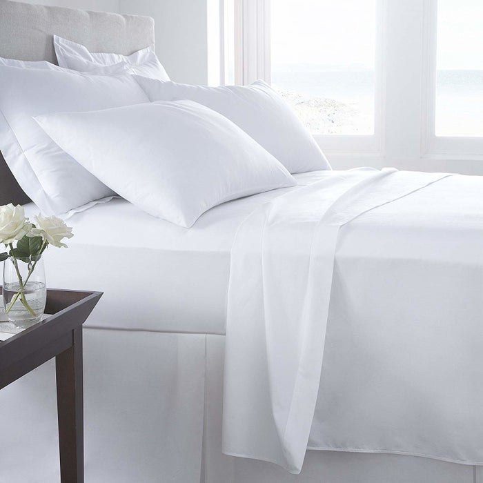 All-white bedroom look with standard bedsheet and pillow cover set