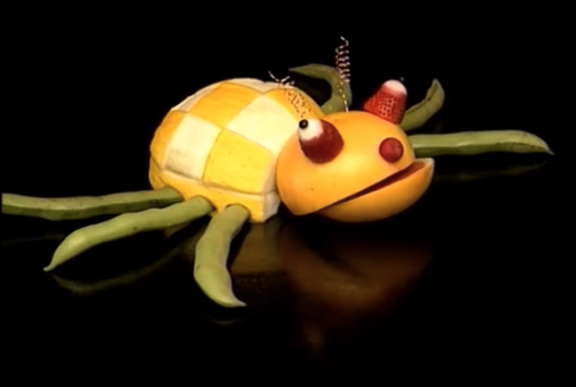 An animal made out fruits and vegetables