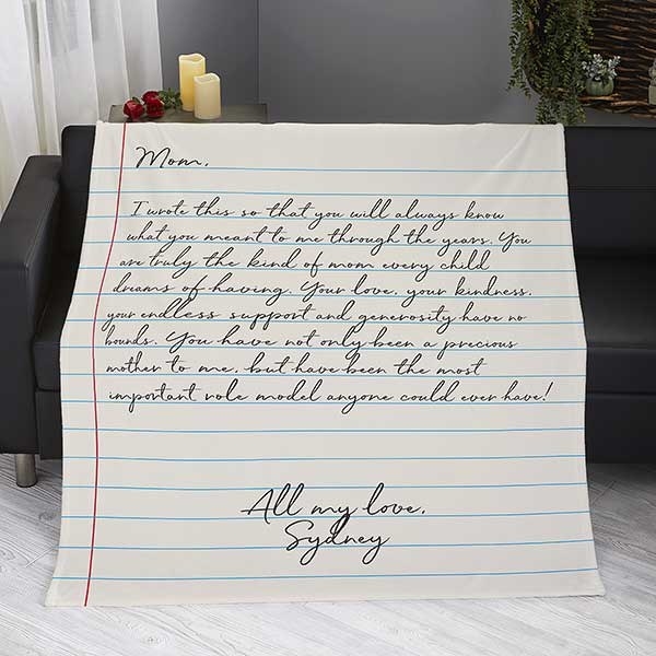 throw blanket printed to look like a handwritten letter on notebook paper