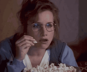 Gabrielle Carteris in &quot;Beverly Hills, 90210&quot; drops popcorn in shock while watching a movie