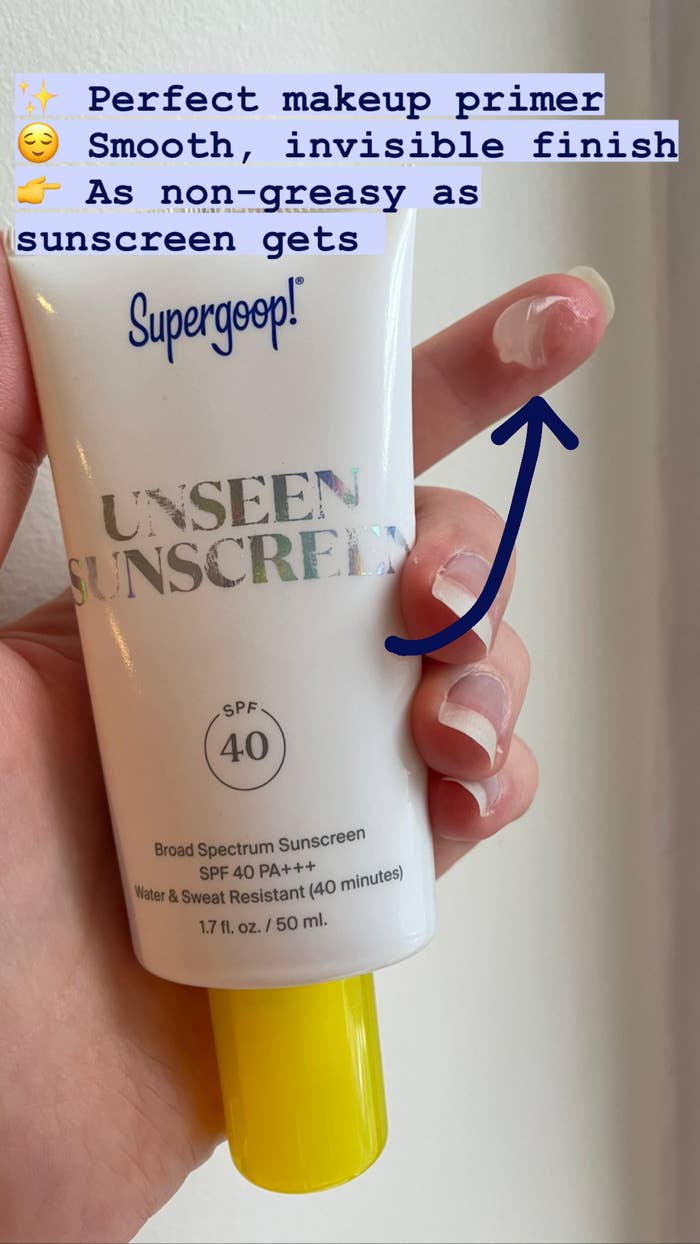 buzzfeed editor holding the 1.7oz bottle with  dab of translucent sunscreen captioned &quot;perfect makeup primer, smooth, invisible finish, as non-greasy as sunscreen gets&quot;