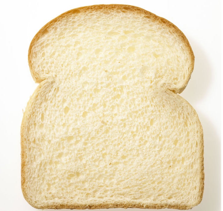A slice of fluffy white bread.
