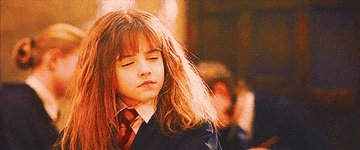 Hermione looking shocked