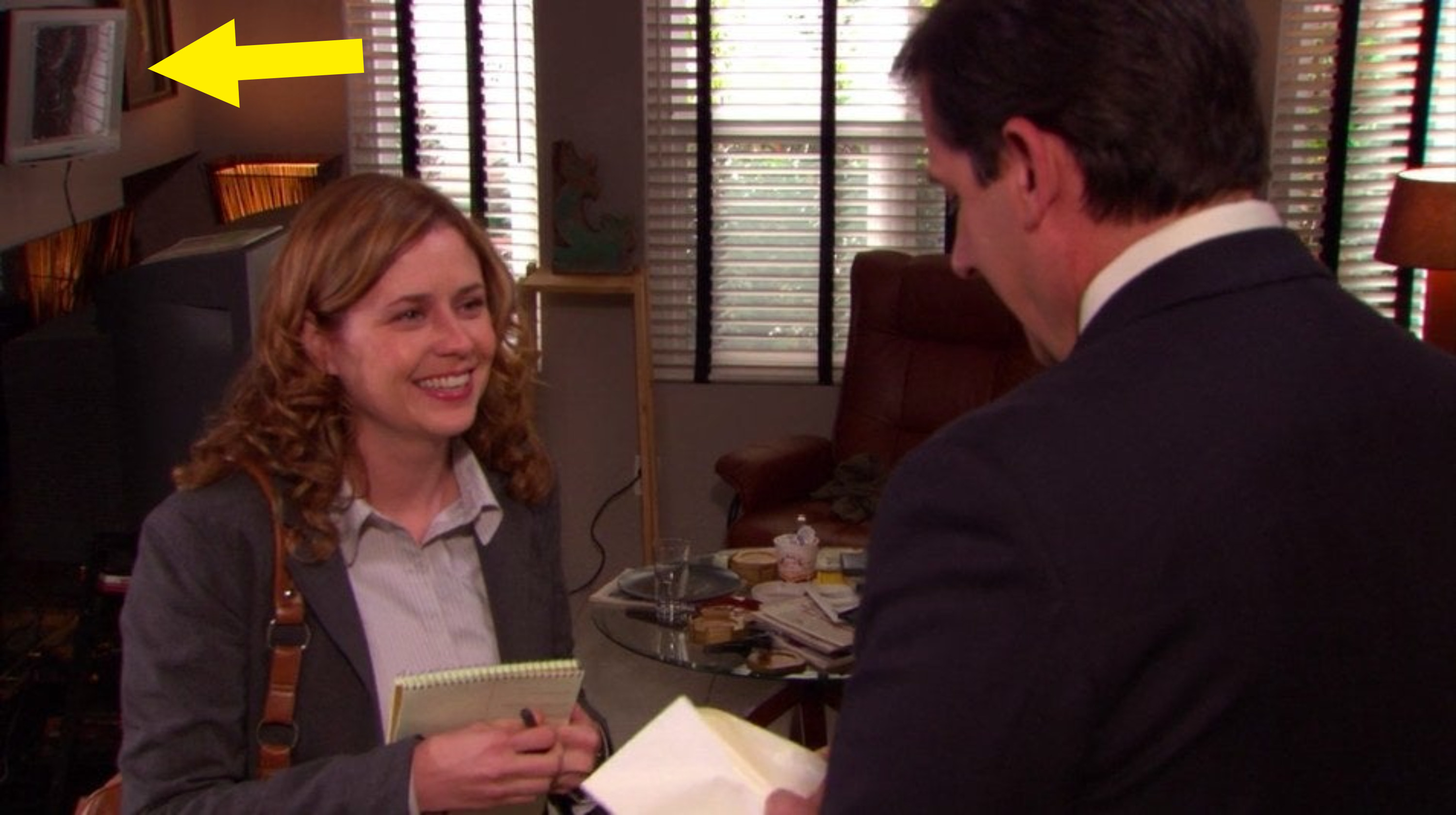 Pam and Michael working on the Michael Scott Paper Company in his living room