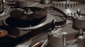 Film being cut and wound on a reel