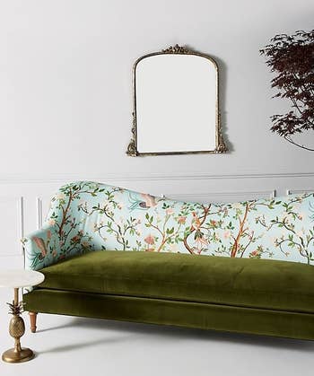 the front of the green velvet and floral sofa