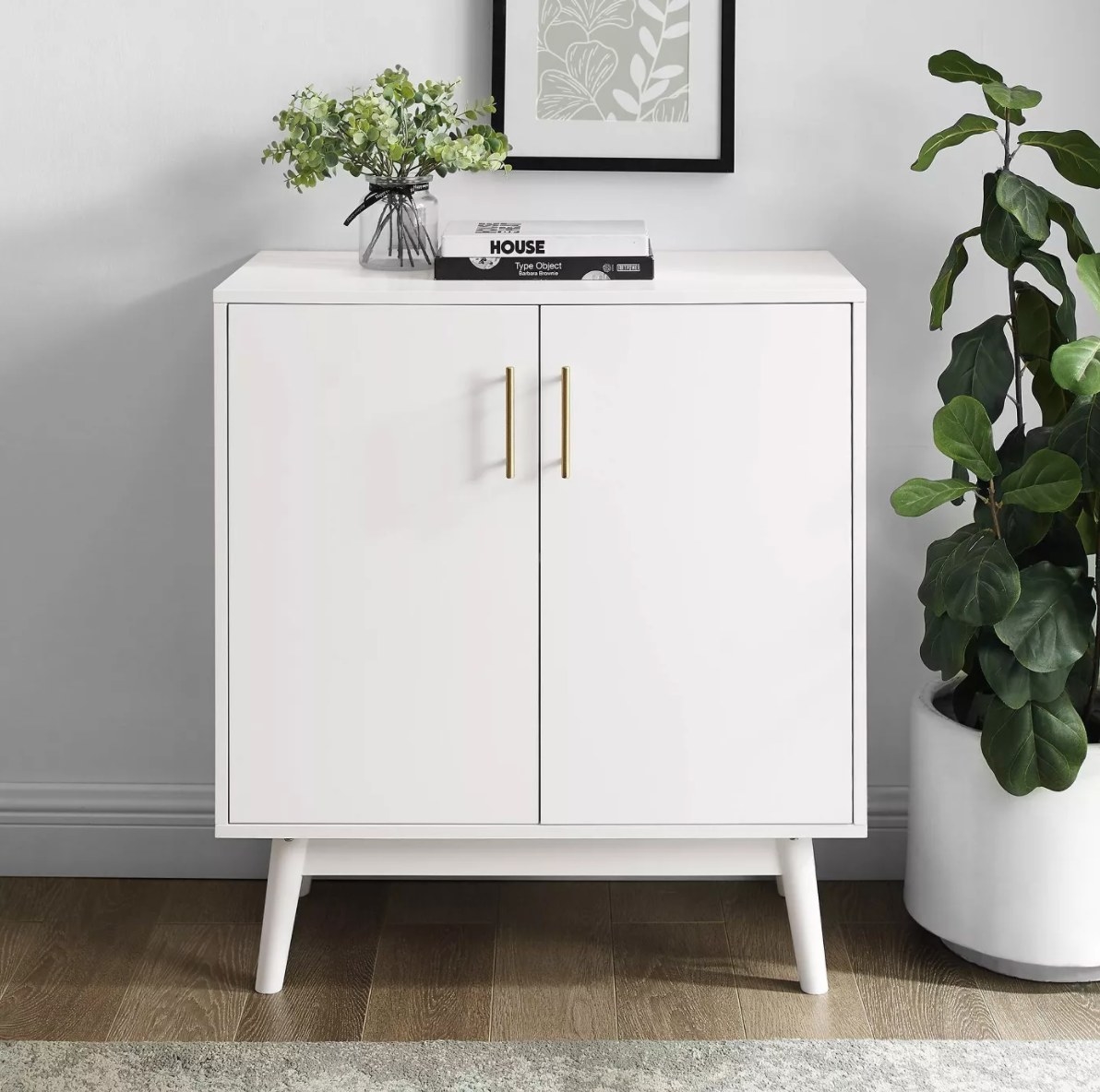 The midcentury modern accent cabinet in white