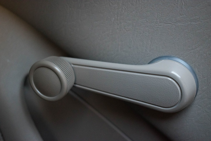 A manual car window crank handle
