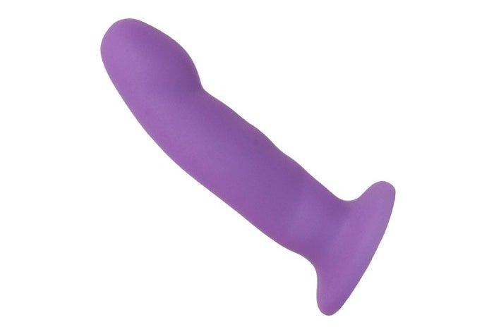 The purple dildo with a suction cup base and slightly thicker, curved tip
