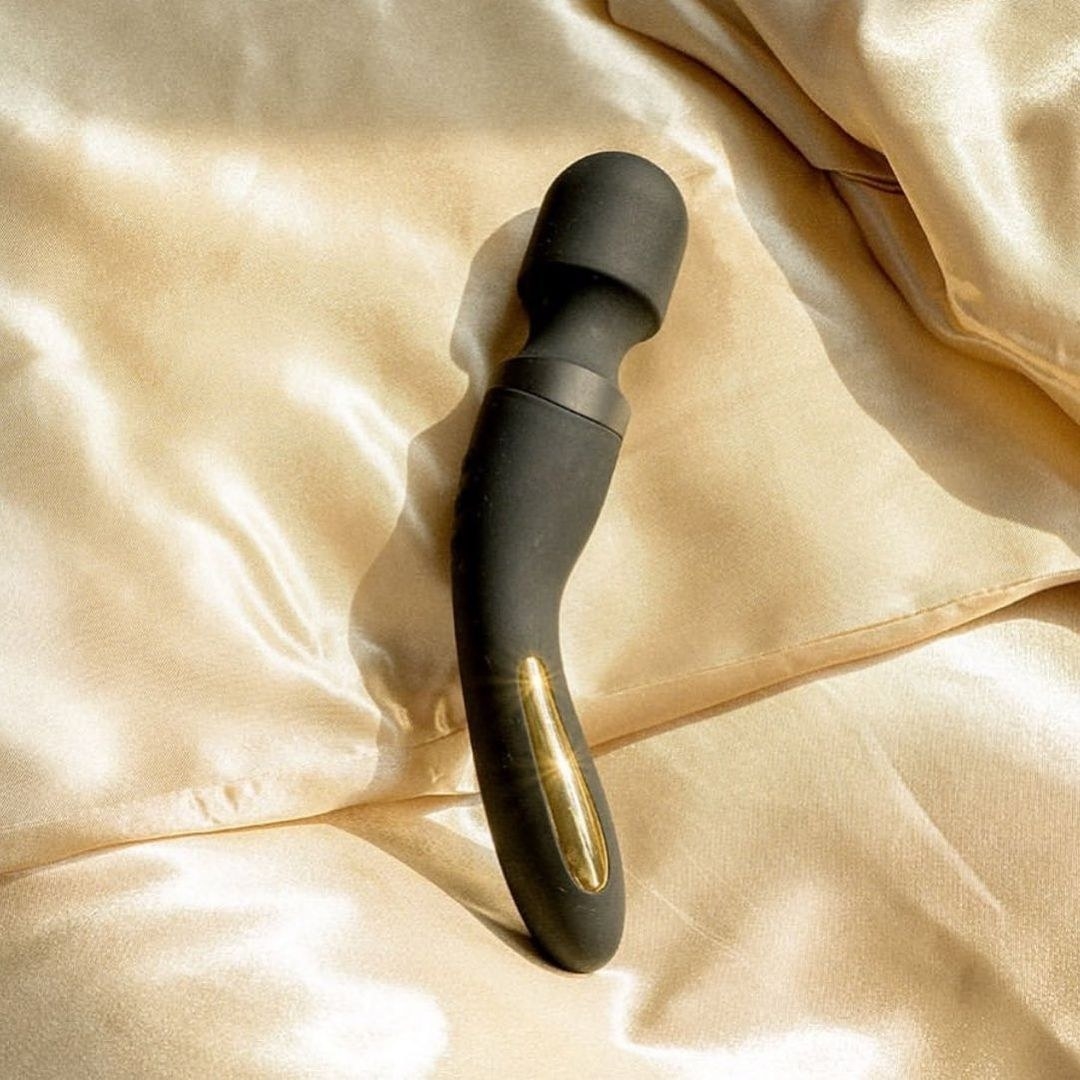The black wand vibrator with a circular, wide tip