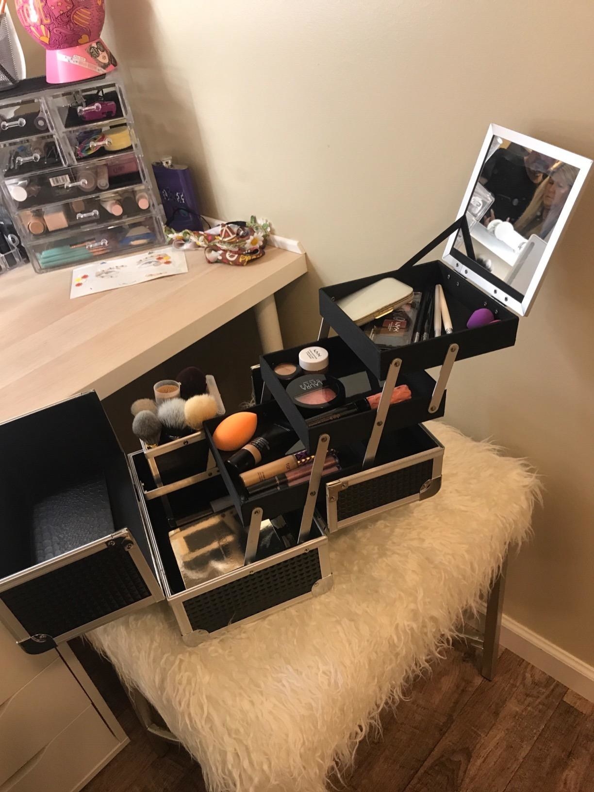 The box, expanded and full of makeup