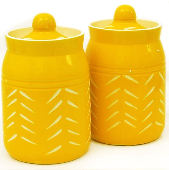 Yellow ceramic jars.