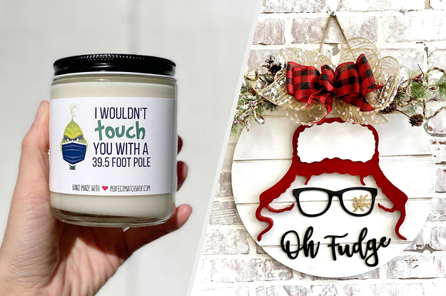 to the left: a grinch themed candle, to the left: a door hanger featuring an outline of ralphie from a christmas story