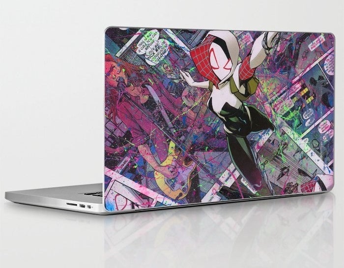 A spider-gwen laptop skin on a macbook