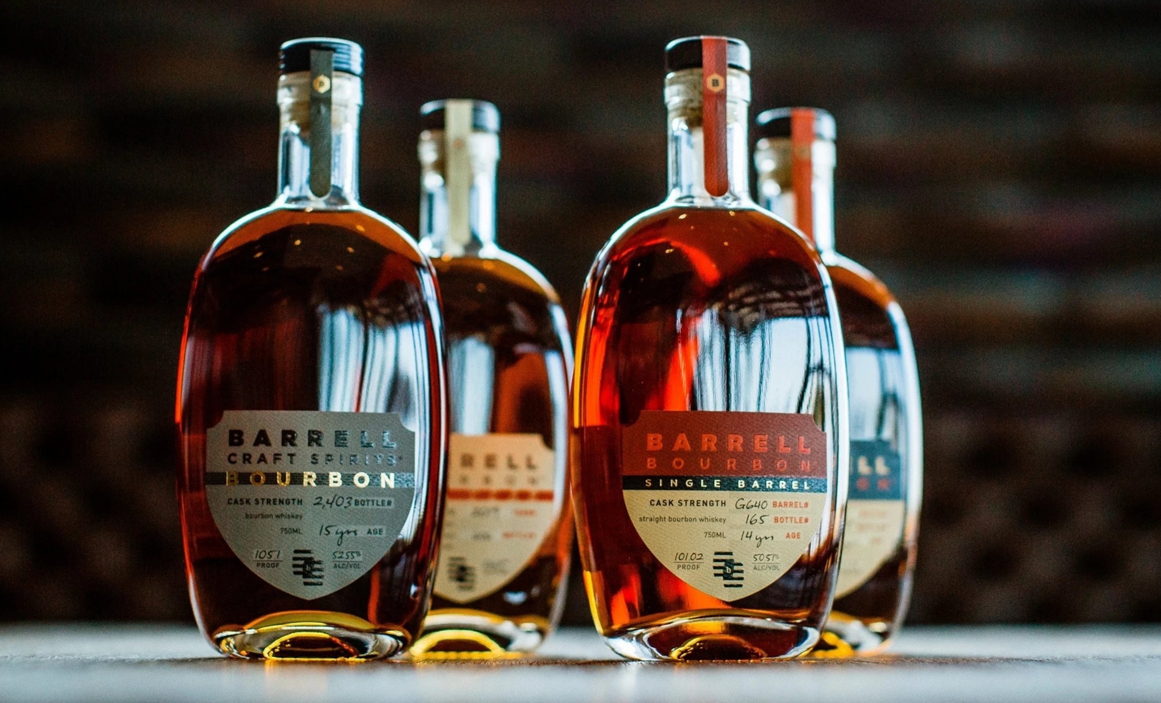 bottles of different flavors of barre bourbon 
