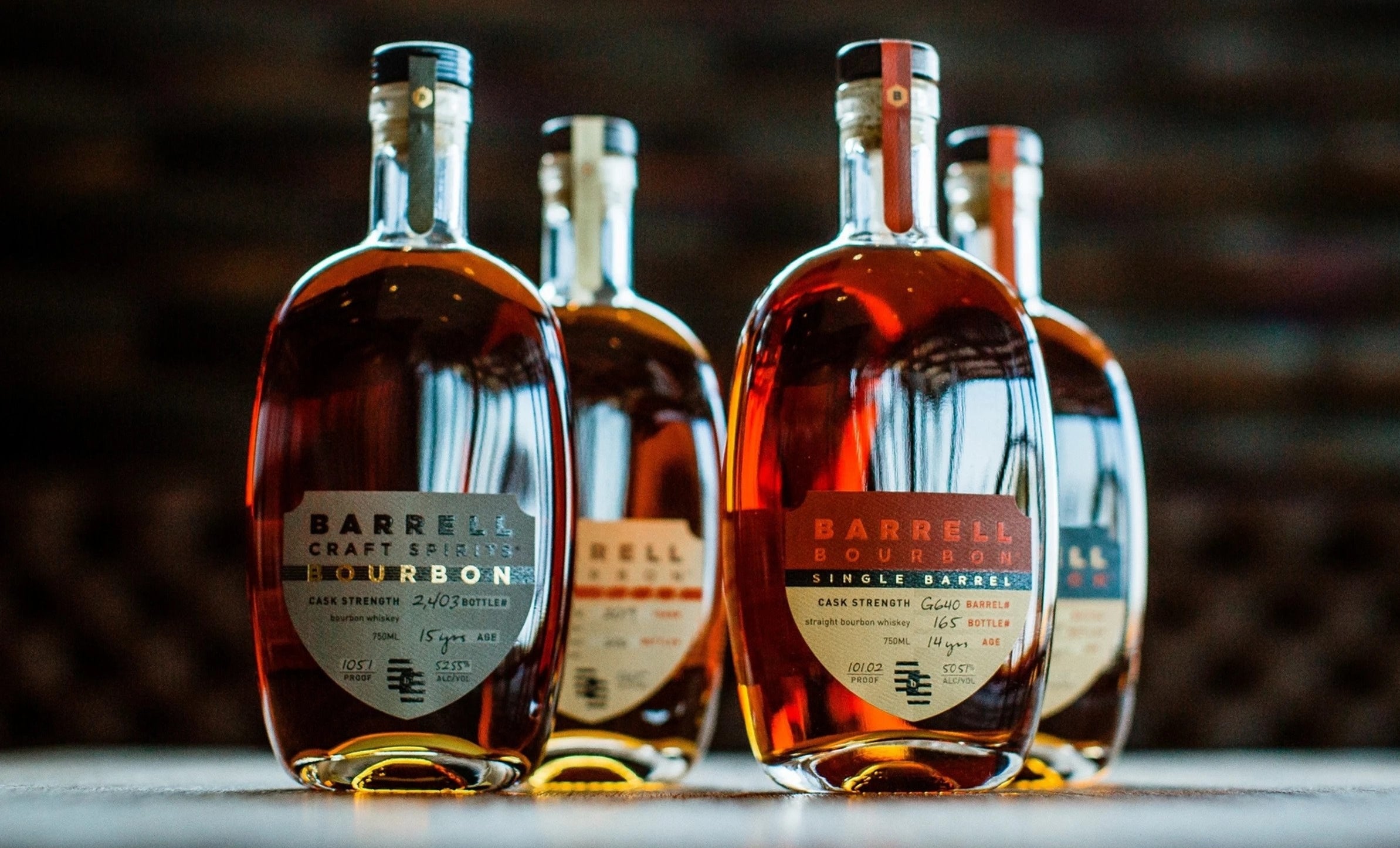 bottles of different flavors of barre bourbon 