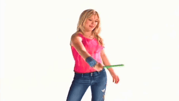 Hilary Duff drawing with the wand and then laughing and shrugging