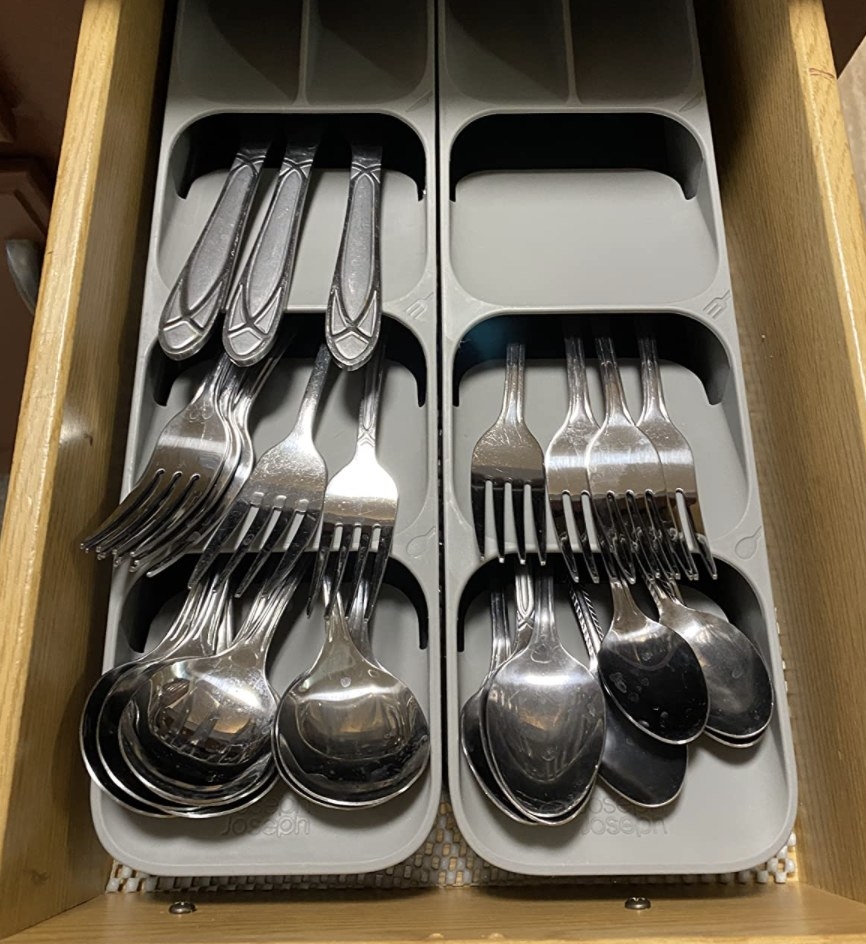 Two organizers in a drawer with cutlery in them