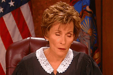 Judge Judy rolling her eyes in extreme annoyance