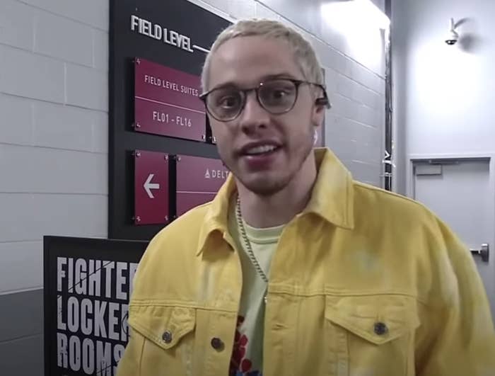 Pete smiling and standing in the hallway by the fighters' locker rooms