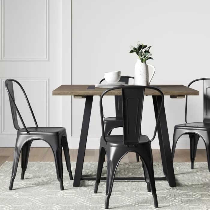 The brown and black dining table