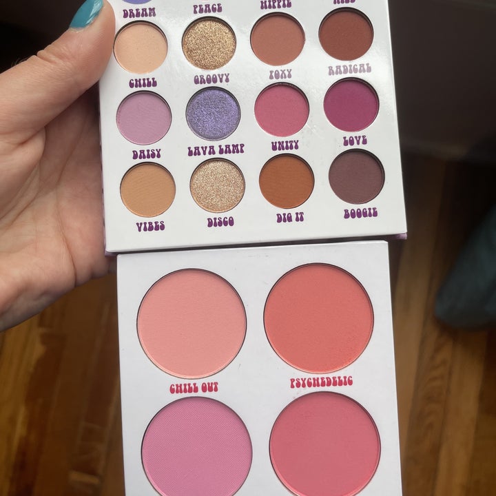 a reviewer photo of the eyeshadow palette and corresponding blush palette 