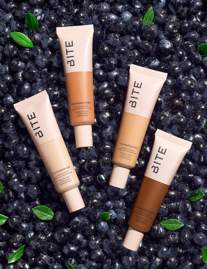 Four tubes of foundation in different colours