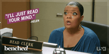 Head Clerk sitting behind a desk, mouthing, &#x27;I&#x27;ll just read your mind.&#x27; The text is also written on the top left side of GIF