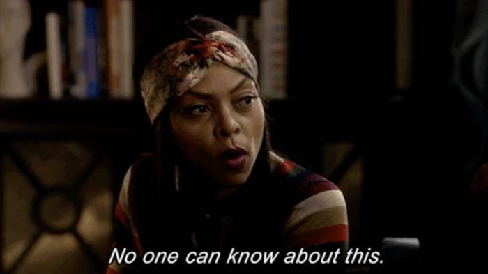 Cookie from "Empire" in a striped shirt and a head wrap