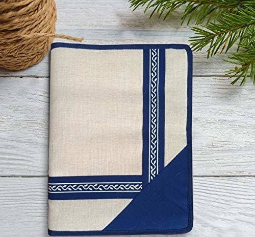 A blue and beige jute folder.