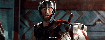 Thor excited exclaiming yes while in full battle armor