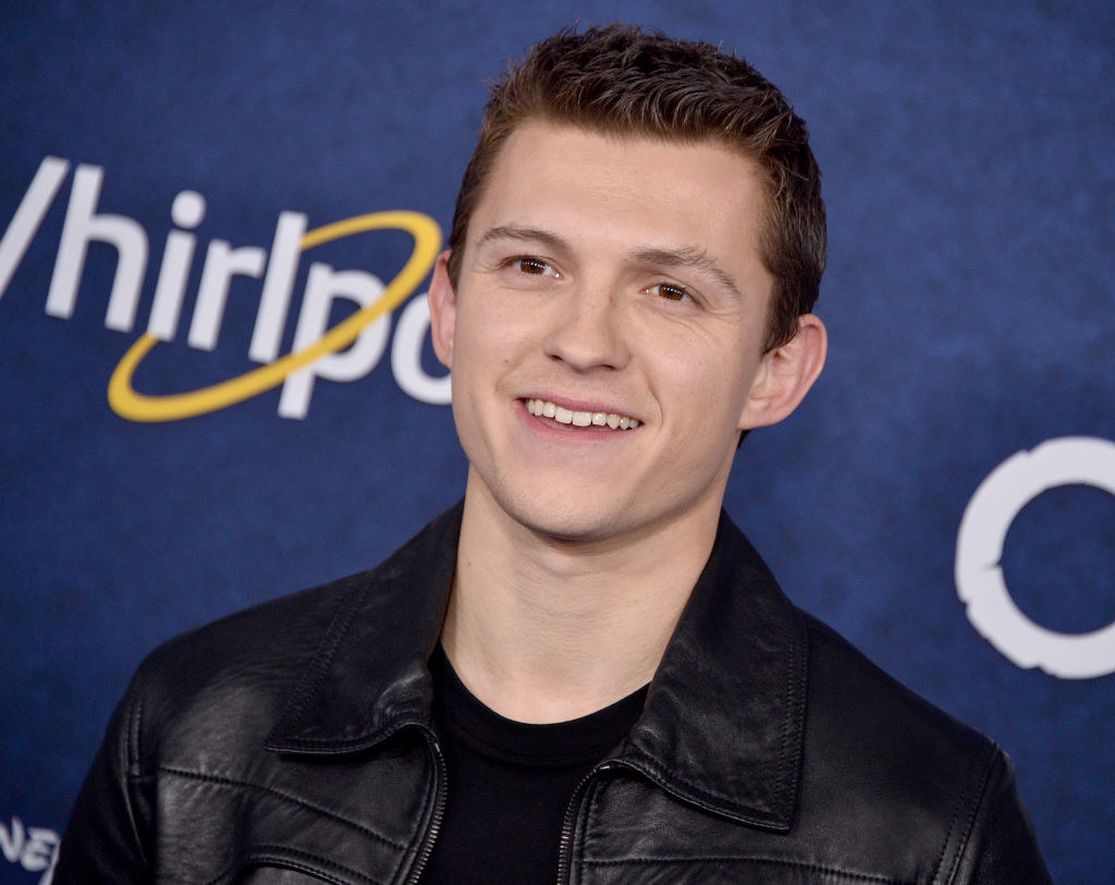 Tom smiling on the red carpet