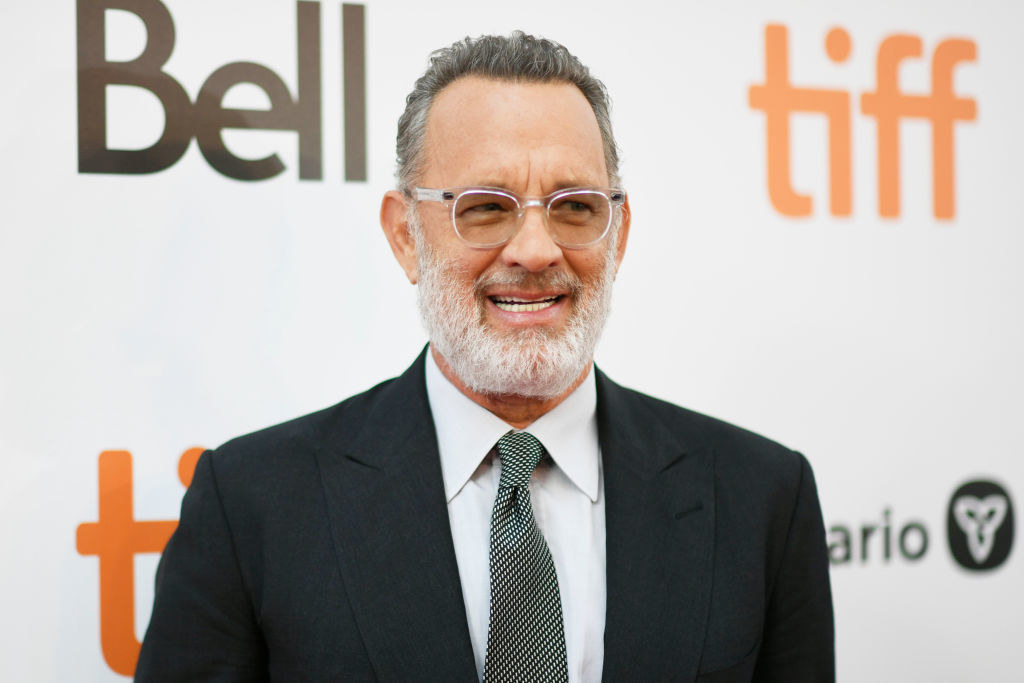 Smiling Hanks with white beard and glasses at TIFF