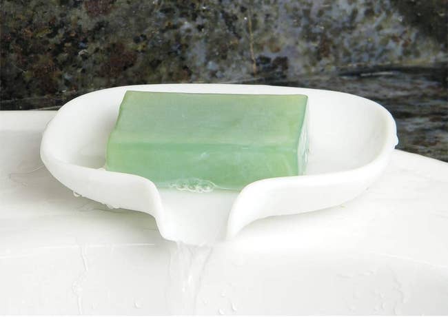 the white silicone dish with soap inside