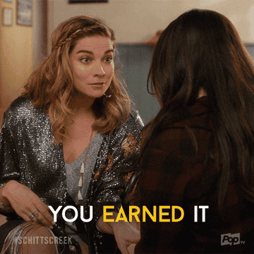 Alexis, from Schitt&#x27;s Creek, saying, &quot;You earned it&quot;.