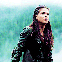 Gif of Octavia from The 100 staring moodily into distance 